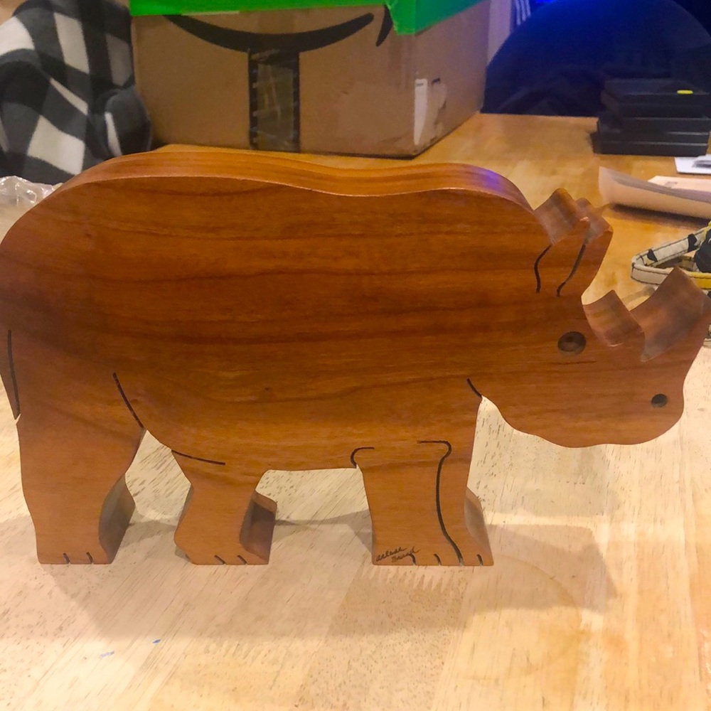 Vintage Arlene Brand carved rhino.